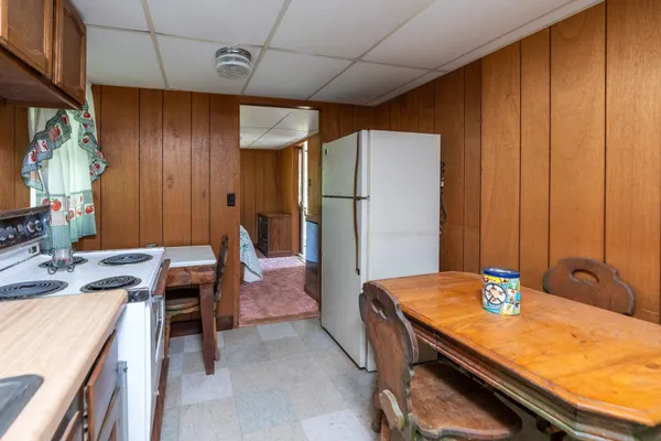 a room with table and chairs
