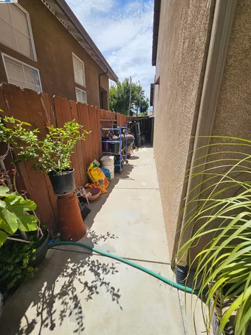 a view of entryway with flower plants