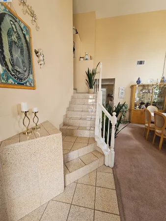 a view of a livingroom with furniture and furniture