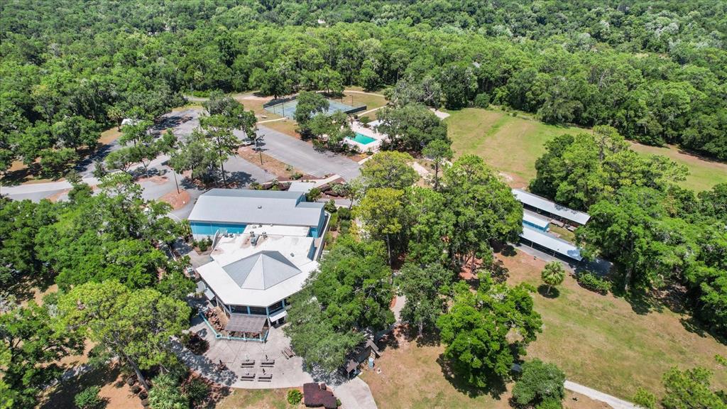 19126 Southwest 101st Street Dunnellon, FL 34432 - Photo 41 of 46 an aerial view of a house with outdoor space and lake view