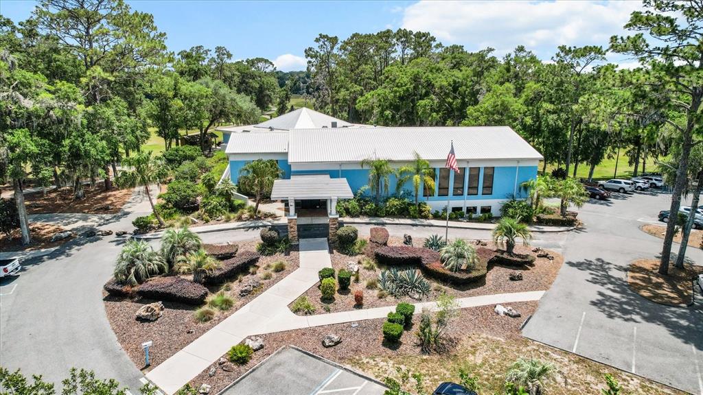 19126 Southwest 101st Street Dunnellon, FL 34432 - Photo 42 of 46 an aerial view of a house with garden space and street view