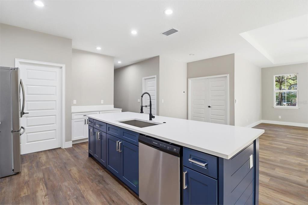 19126 Southwest 101st Street Dunnellon, FL 34432 - Photo 10 of 46 a kitchen with a sink and cabinets