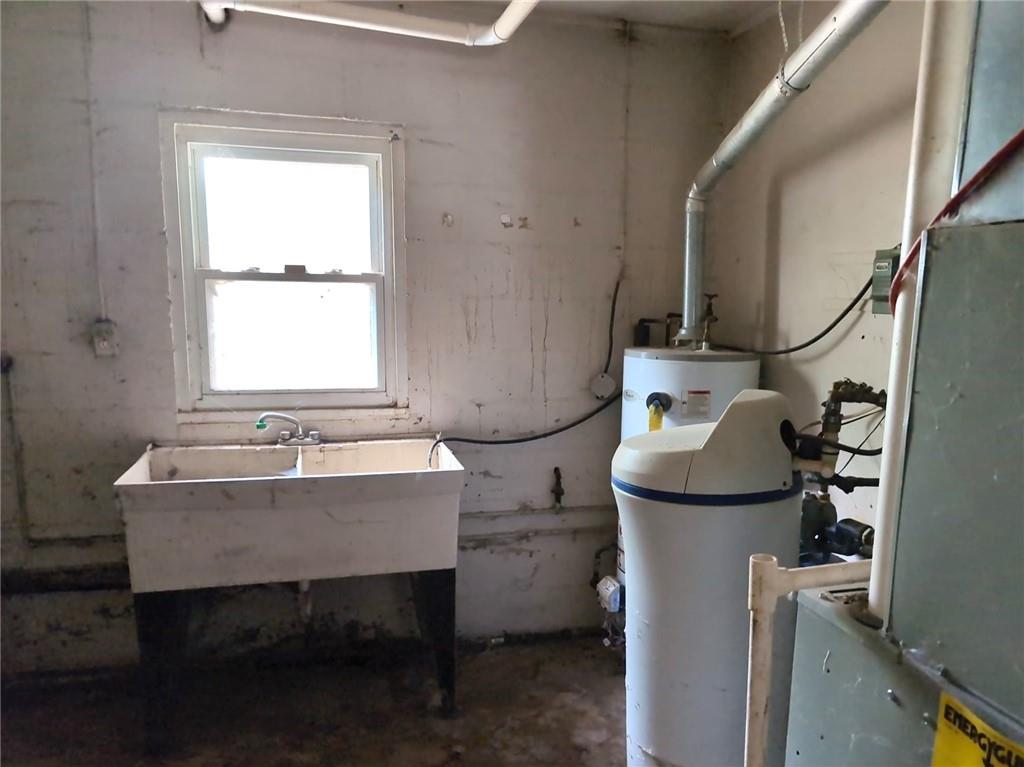 138 Bulger Candor Road Bulger, PA 15019 - Photo 11 of 12 a bathroom with a sink toilet and window