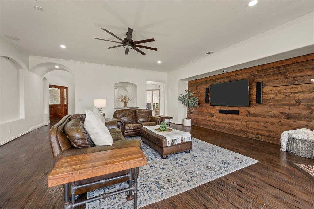 2038 Azalea Trail Irving, TX 75063 - Photo 12 of 39 a living room with furniture and a flat screen tv
