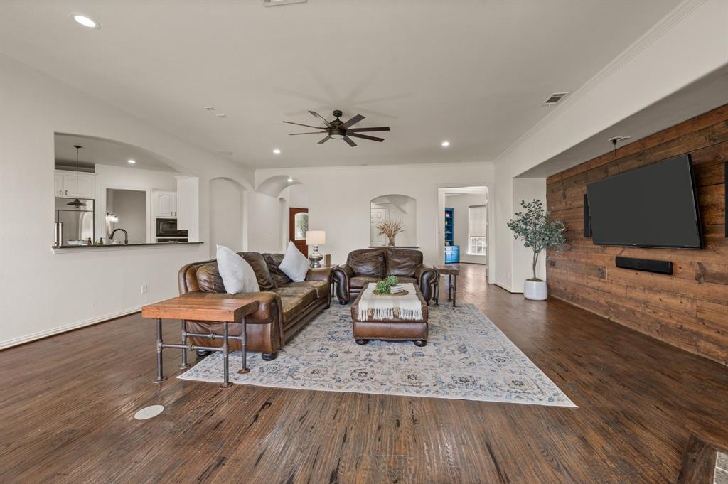 2038 Azalea Trail Irving, TX 75063 - Photo 13 of 39 a living room with furniture and a flat screen tv