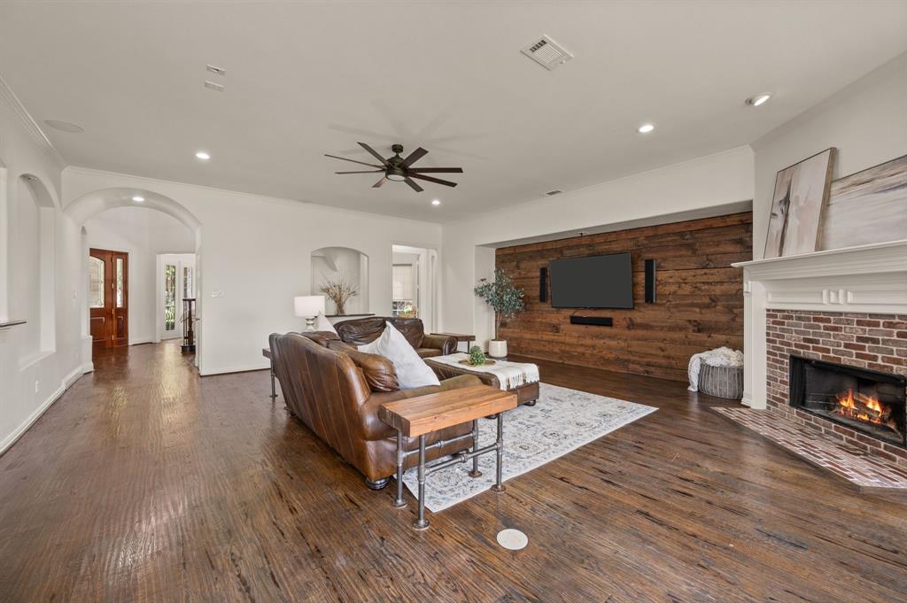 2038 Azalea Trail Irving, TX 75063 - Photo 14 of 39 a living room with furniture fireplace and flat screen tv