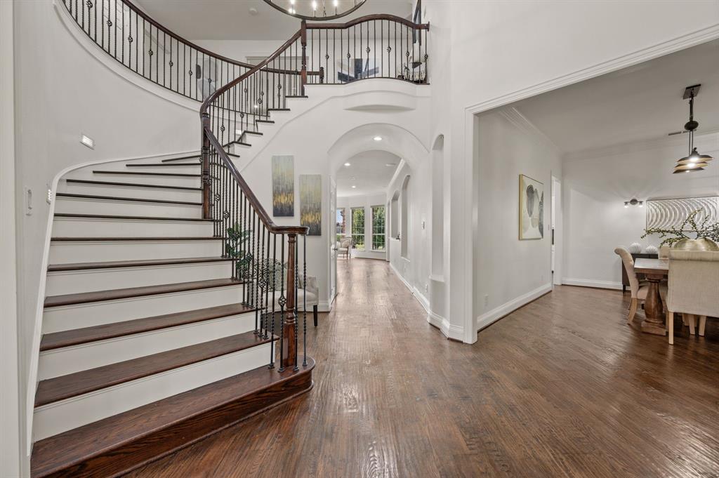 2038 Azalea Trail Irving, TX 75063 - Photo 2 of 39 a view of entryway livingroom and hall with wooden floor