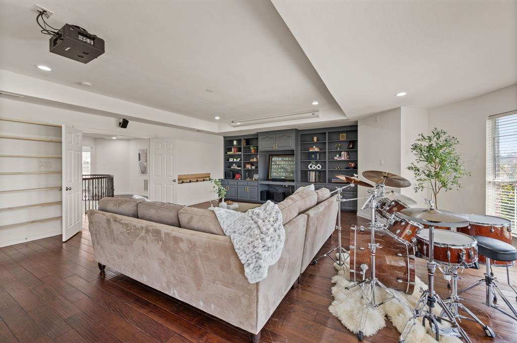 2038 Azalea Trail Irving, TX 75063 - Photo 26 of 39 a living room with furniture and a wooden floor