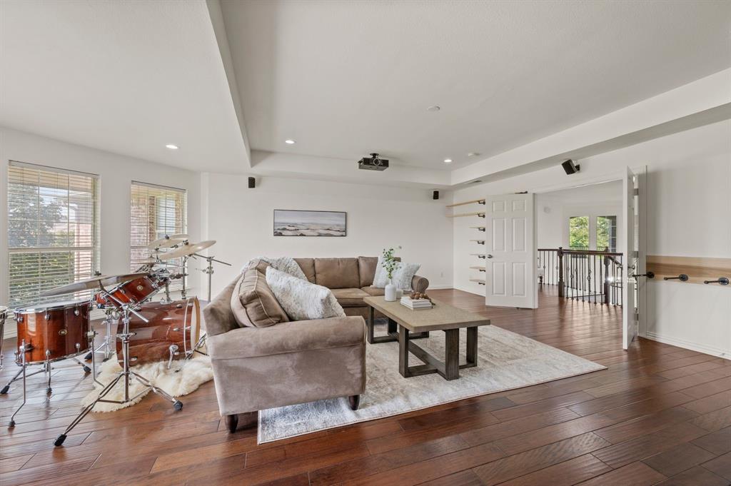 2038 Azalea Trail Irving, TX 75063 - Photo 27 of 39 a living room with furniture and wooden floor