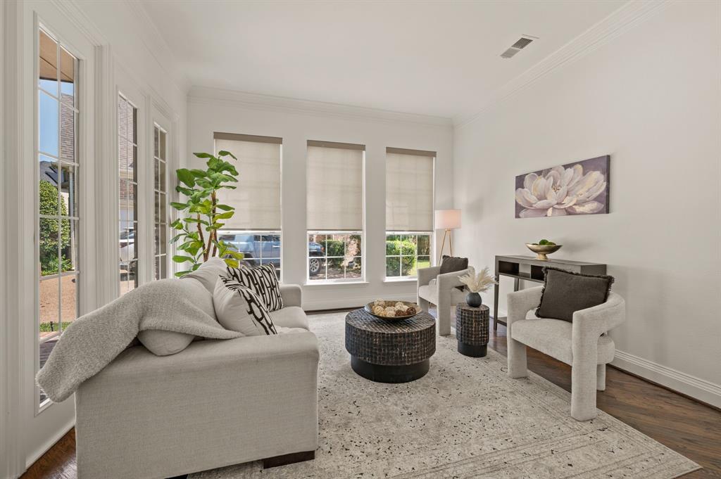 2038 Azalea Trail Irving, TX 75063 - Photo 4 of 39 a living room with furniture a couch and a potted plant