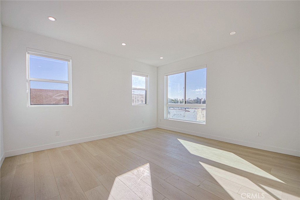 2202 Thurman Avenue Los Angeles, CA 90016 - Photo 14 of 25 a view of an empty room with a window