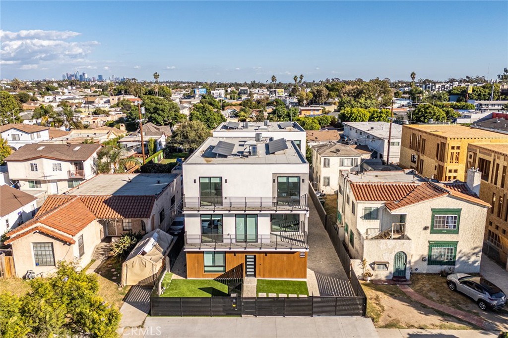 2202 Thurman Avenue Los Angeles, CA 90016 - Photo 23 of 25 an aerial view of a house with a yard