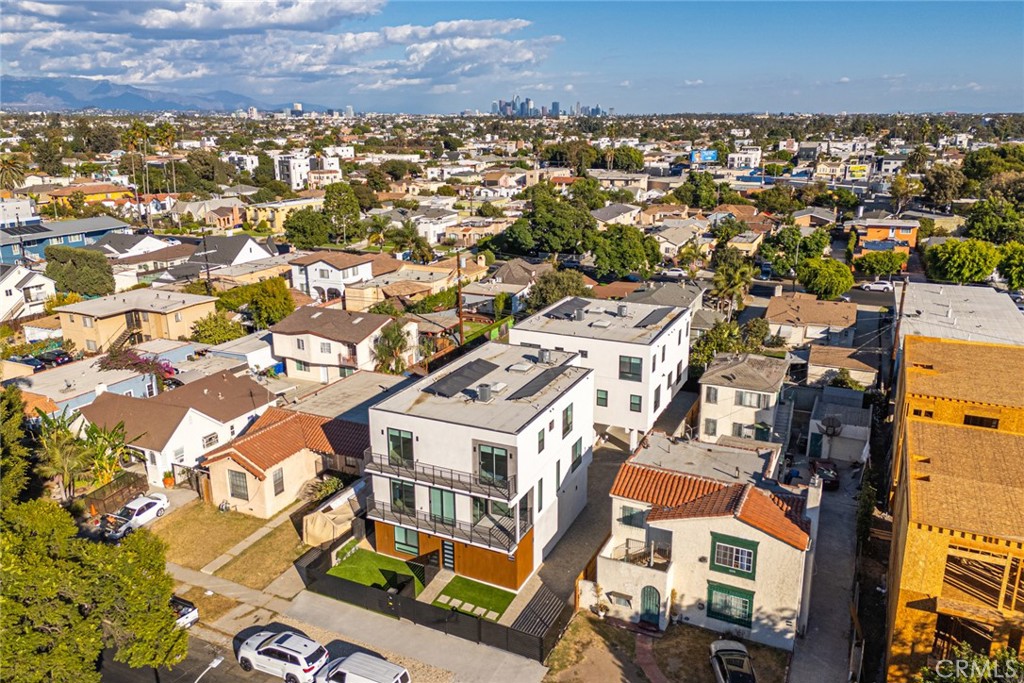 2202 Thurman Avenue Los Angeles, CA 90016 - Photo 7 of 25 an aerial view of a residential apartment building with parking space