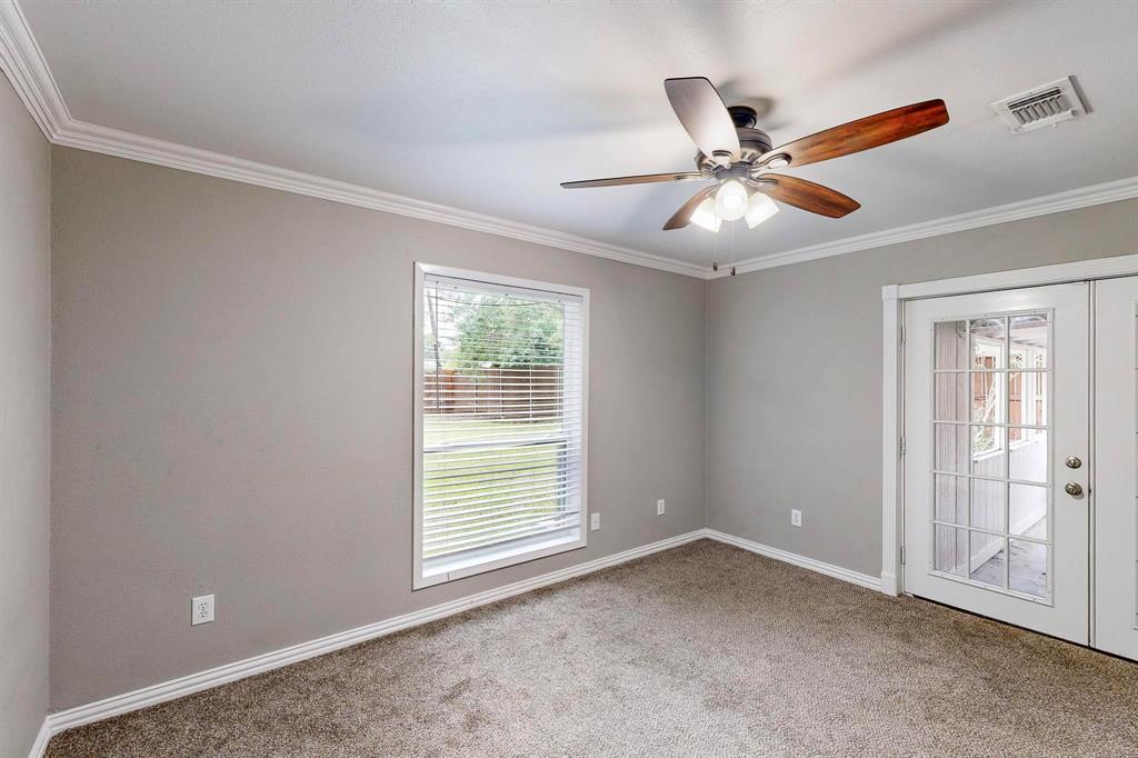 3264 Northaven Road Dallas, TX 75229 - Photo 15 of 35 Carpeted spare room with ceiling fan, ornamental molding, and baseboards