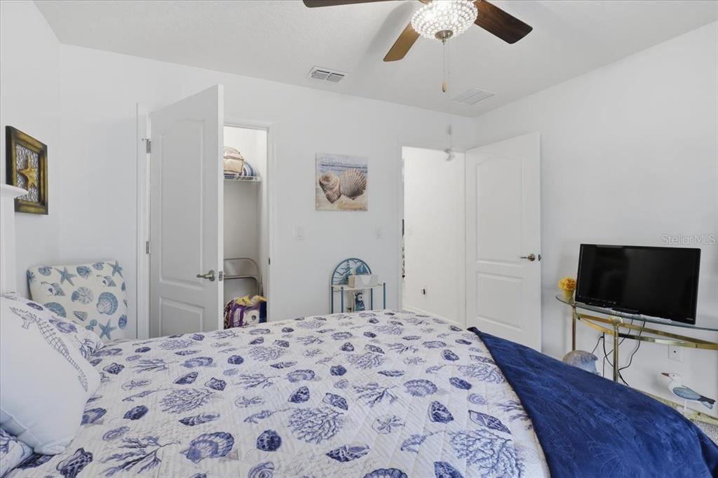 35 Birdie Way Bunnell, FL 32110 - Photo 37 of 57 a bedroom with bed and flat screen tv