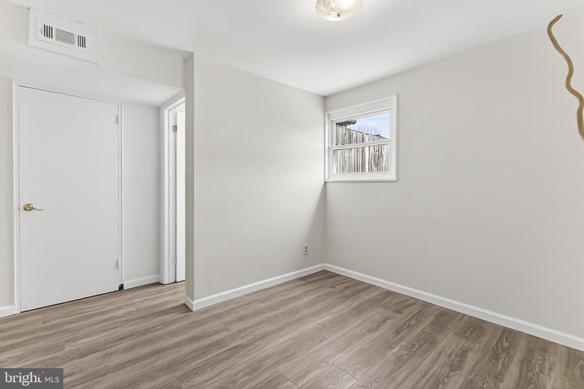 5213 11th Street Northeast Washington, DC 20011 - Photo 36 of 50 Spacious room with updated flooring