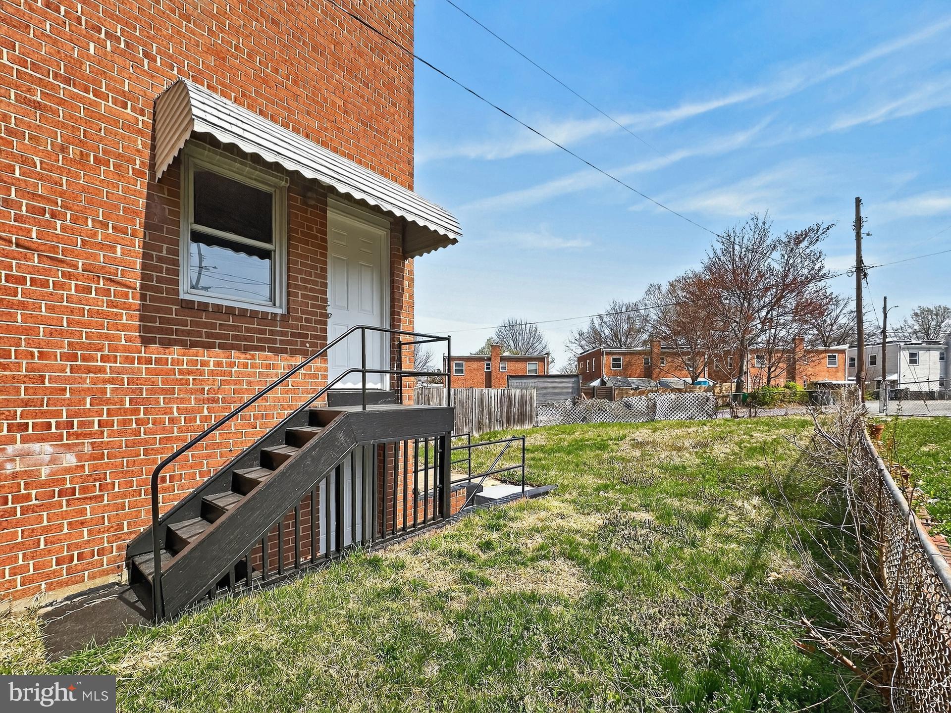 5213 11th Street Northeast Washington, DC 20011 - Photo 40 of 50 Exit to rear yard. Extra parking in the rear