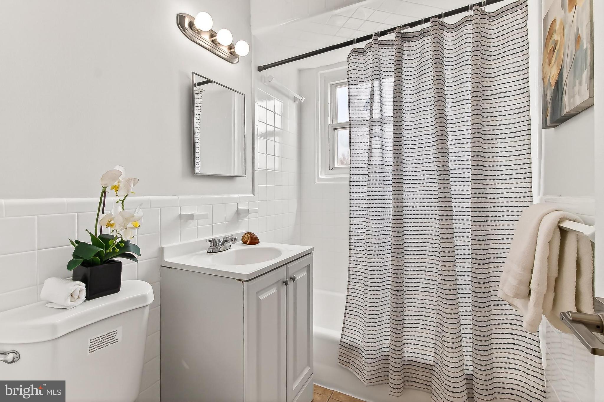 5213 11th Street Northeast Washington, DC 20011 - Photo 10 of 50 Clean and bright bathroom with modern touches