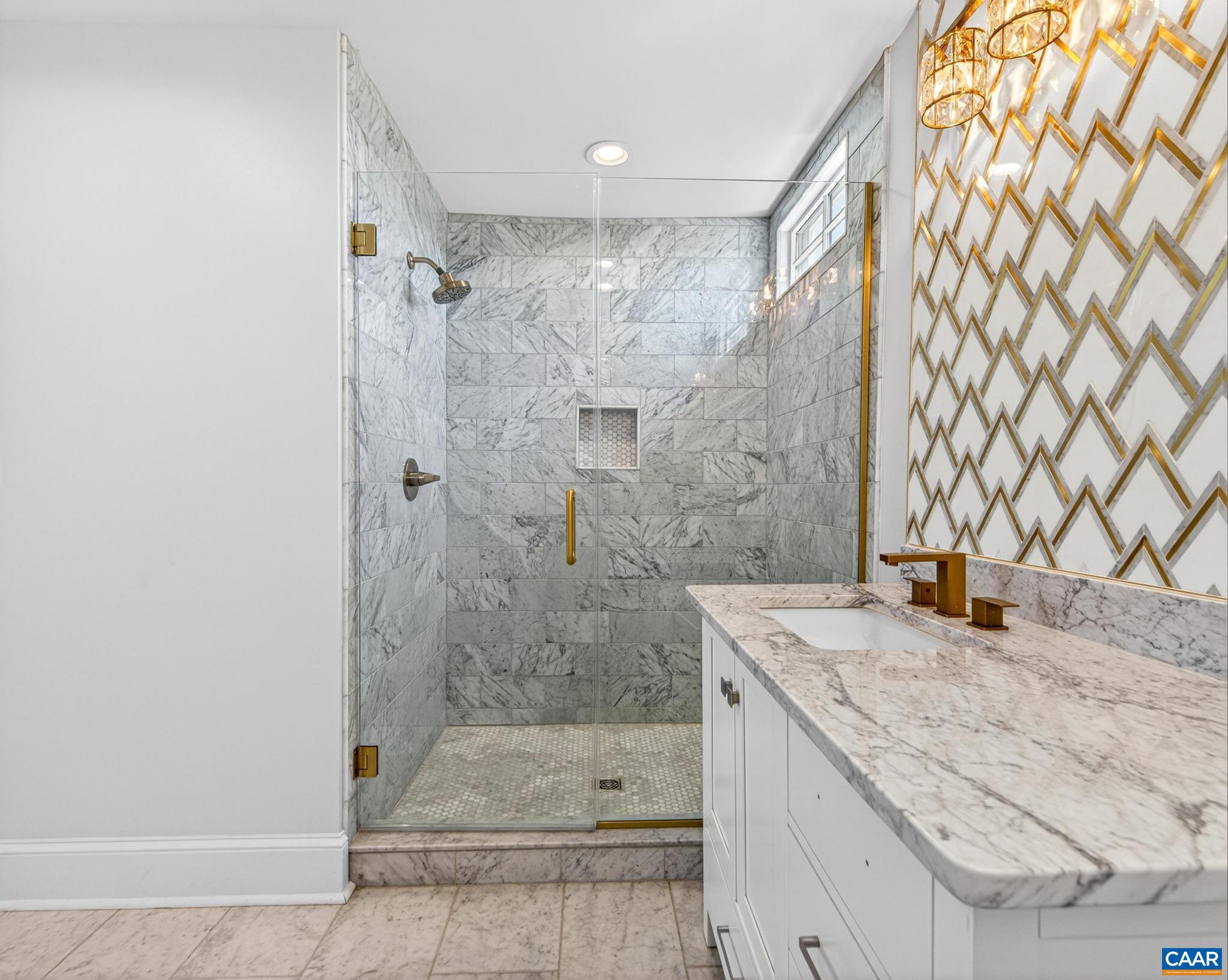 481 Race Ground Road Somerset, VA 22972 - Photo 20 of 53 a bathroom with a granite countertop sink a mirror and shower