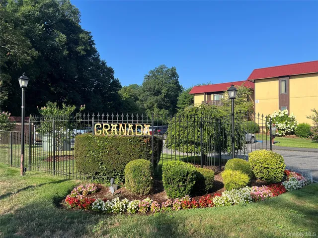 a garden view with a seating space