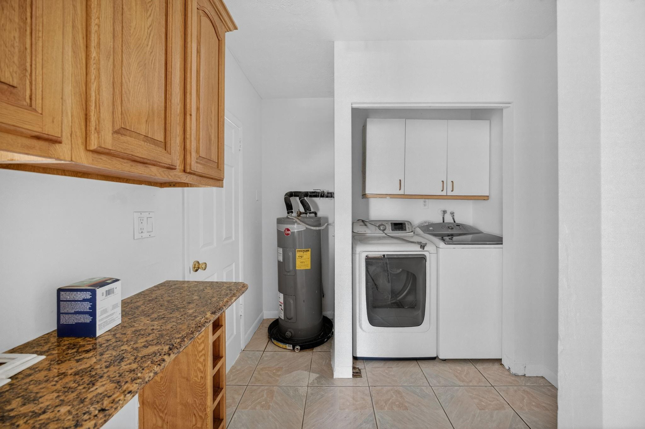 11720 Southwest 176th Street Miami, FL 33177 - Photo 18 of 31 a utility room with dryer and washer