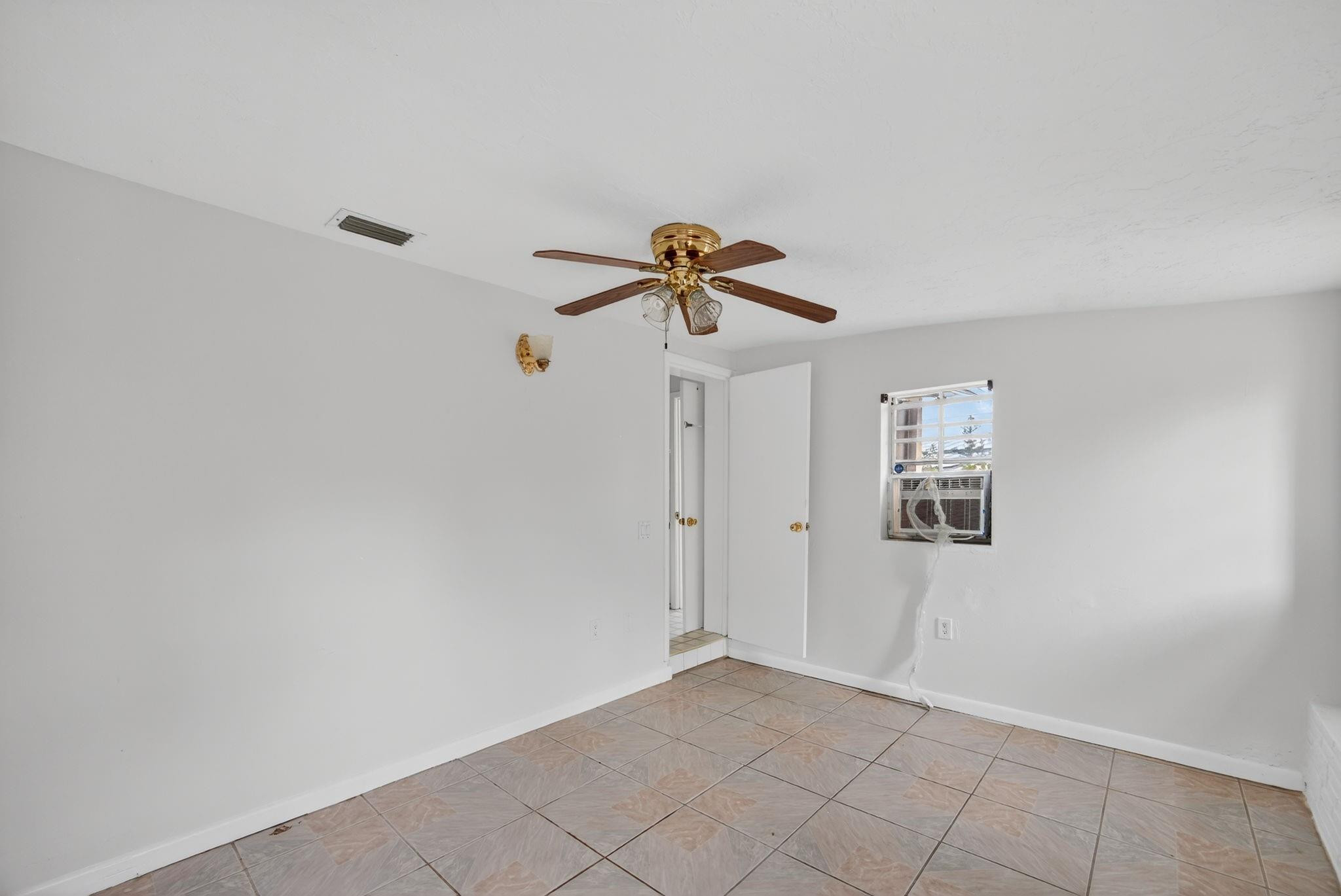 11720 Southwest 176th Street Miami, FL 33177 - Photo 23 of 31 a view of a room with window