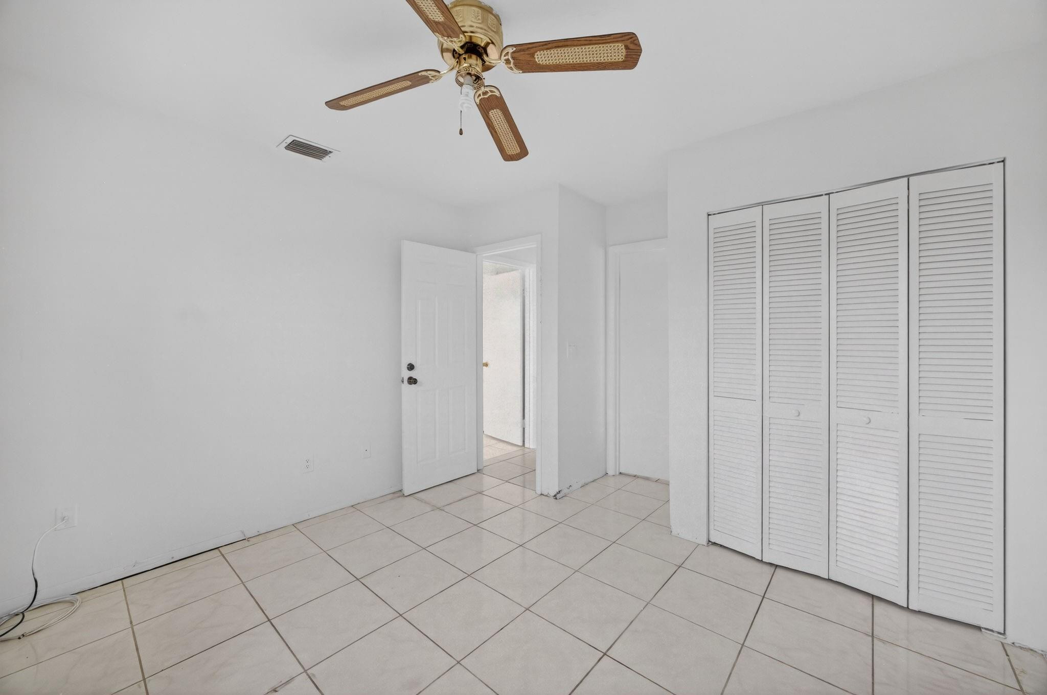 11720 Southwest 176th Street Miami, FL 33177 - Photo 29 of 31 wooden floor in an empty room