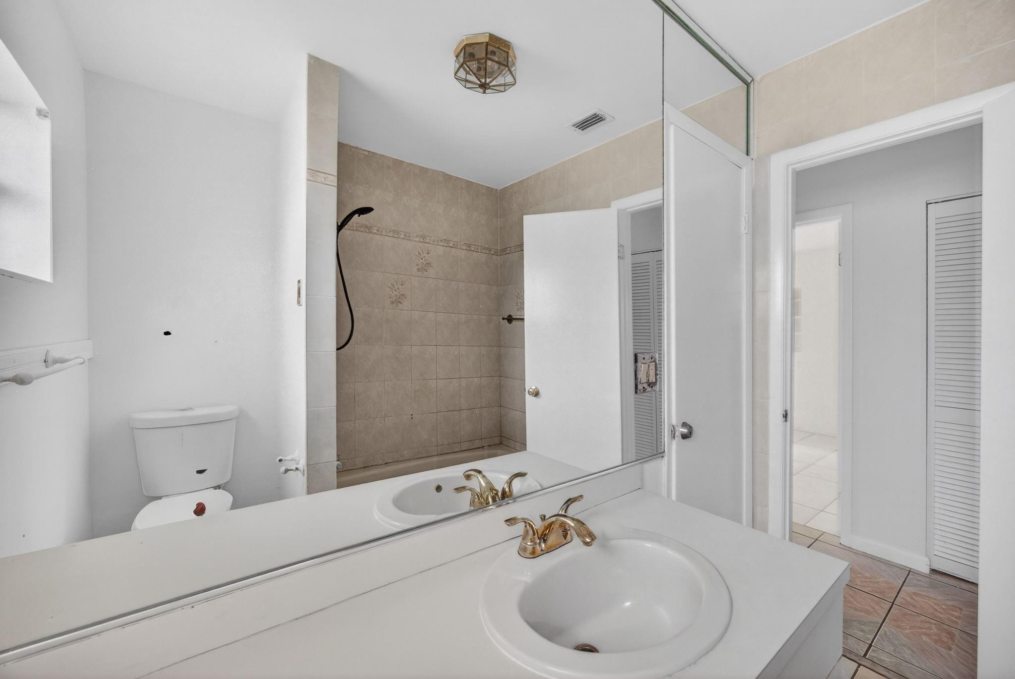 11720 Southwest 176th Street Miami, FL 33177 - Photo 31 of 31 a bathroom with a sink and a mirror