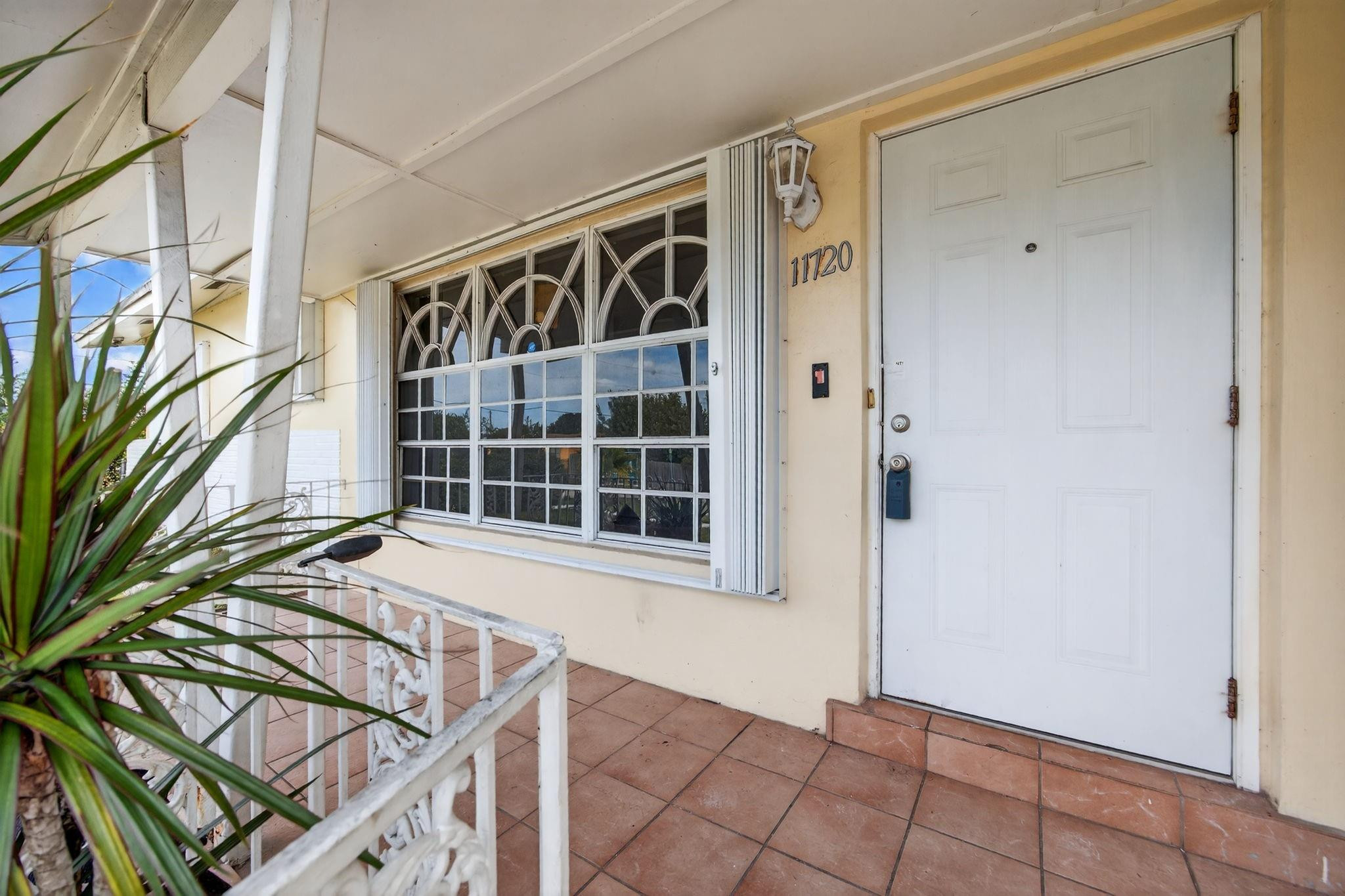 11720 Southwest 176th Street Miami, FL 33177 - Photo 9 of 31 a view of house with entryway