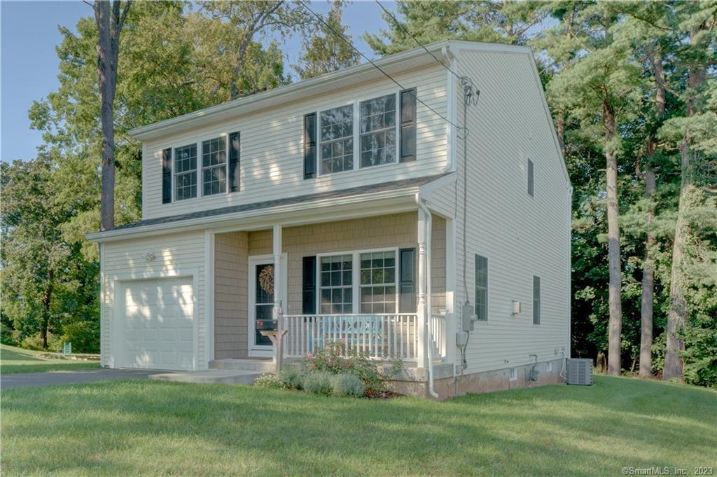 180 East Ridge Road Middletown, CT 06457 - Photo 1 of 1 a front view of a house with a yard