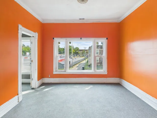 an empty room with window