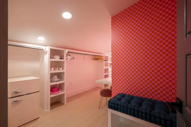 a kitchen with a refrigerator and a sink