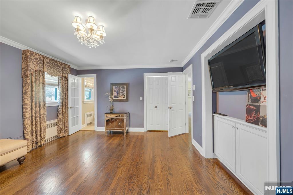 117 Wanamaker Avenue Oradell, NJ 07649 - Photo 27 of 49 a view of a livingroom with furniture wooden floor and a window