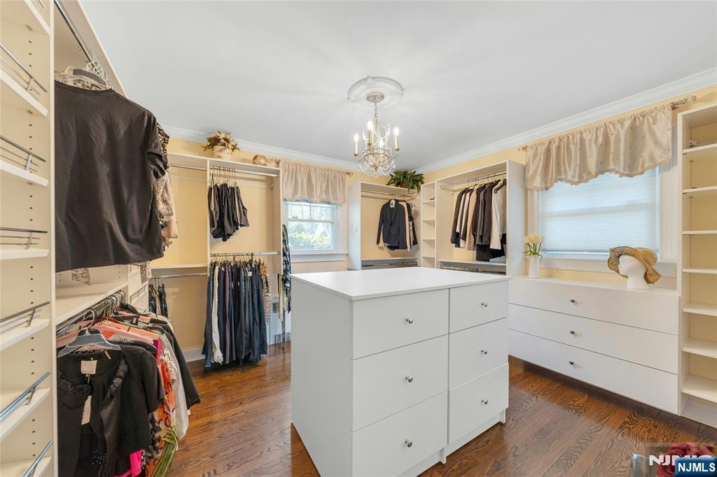 117 Wanamaker Avenue Oradell, NJ 07649 - Photo 29 of 49 a view of walk in closet with clothes and shoes