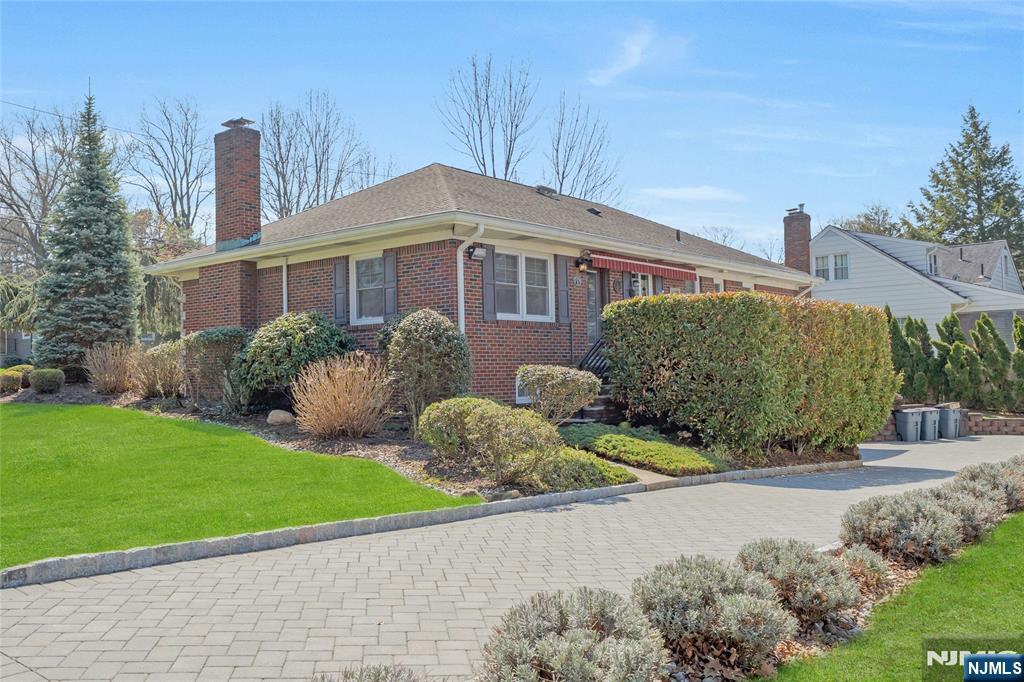 117 Wanamaker Avenue Oradell, NJ 07649 - Photo 4 of 49 a front view of a house with garden