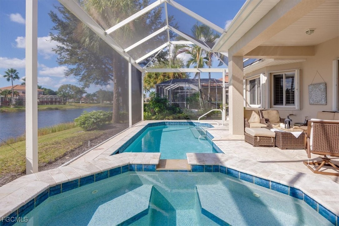 9159 Spring Mountain Way Fort Myers, FL 33908 - Photo 22 of 48 a view of swimming pool with a patio