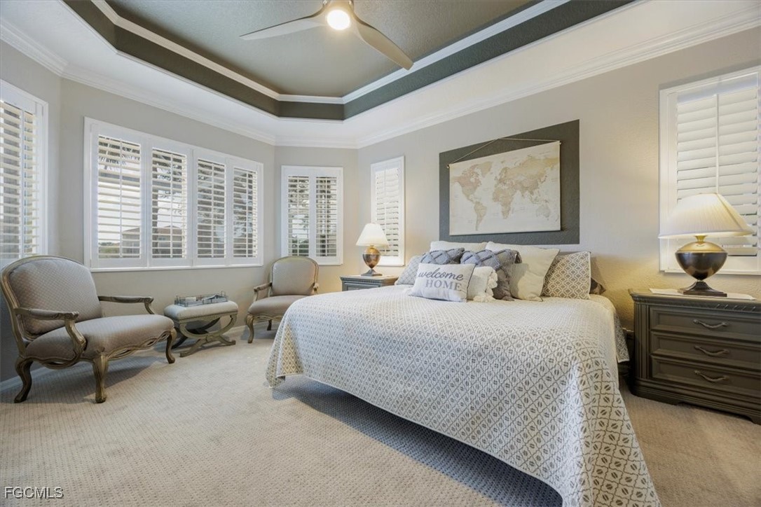 9159 Spring Mountain Way Fort Myers, FL 33908 - Photo 26 of 48 a bedroom with bed and window