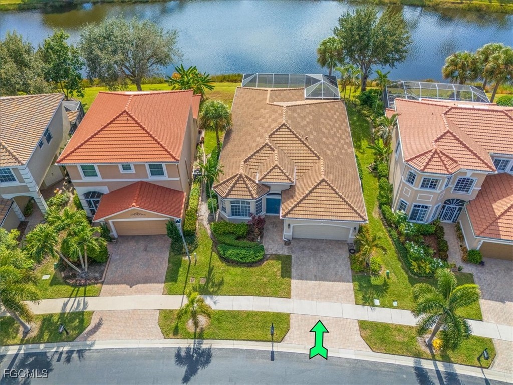 9159 Spring Mountain Way Fort Myers, FL 33908 - Photo 39 of 48 an aerial view of a house with swimming pool and sitting area