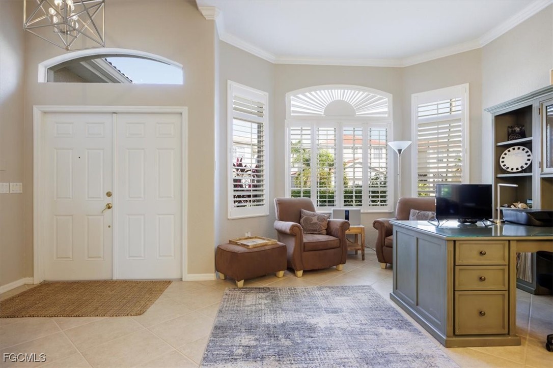 9159 Spring Mountain Way Fort Myers, FL 33908 - Photo 7 of 48 a view of a livingroom with workspace and a window