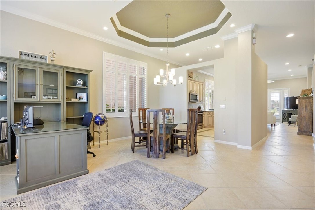 9159 Spring Mountain Way Fort Myers, FL 33908 - Photo 9 of 48 a view of a dining area with furniture