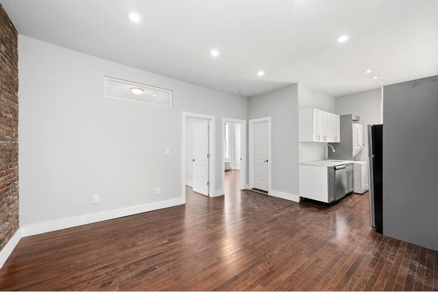 164 Dikeman Street, Unit 3R Brooklyn, NY 11231 - Photo 3 of 6 a view of a kitchen with refrigerator and wooden floor