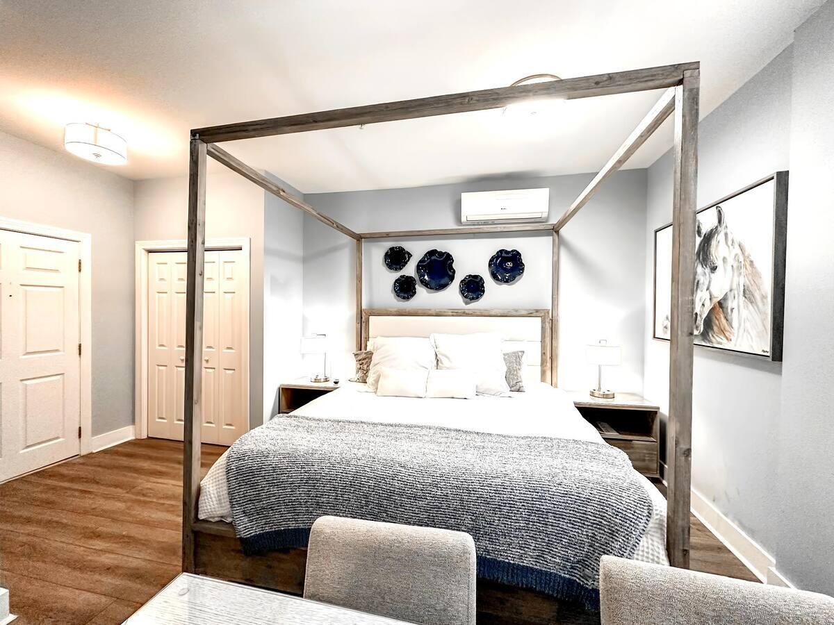 10343 East County Highway 30A, Unit B275 Inlet Beach, FL 32413 - Photo 1 of 25 a bedroom with a bed and wooden floor