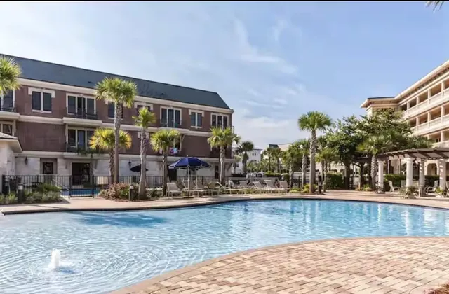 a view of a house with swimming pool