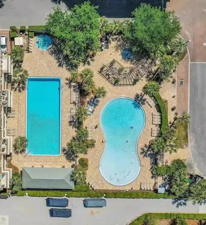 an aerial view of a swimming pool