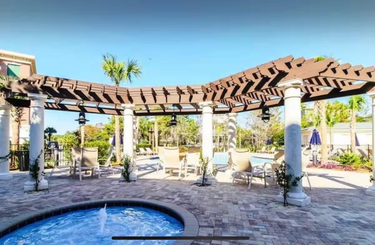 10343 East County Highway 30A, Unit B275 Inlet Beach, FL 32413 - Photo 16 of 25 a view of a dining table and chairs