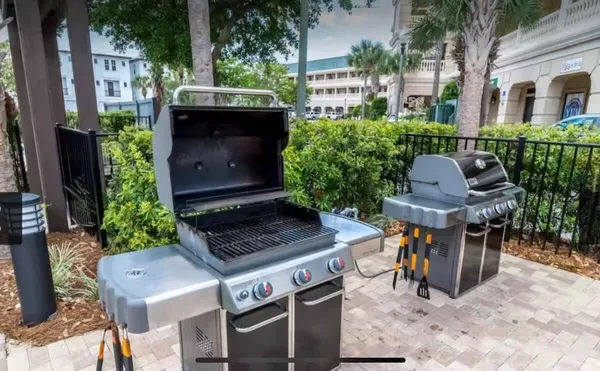 a view of an chairs and table in the patio