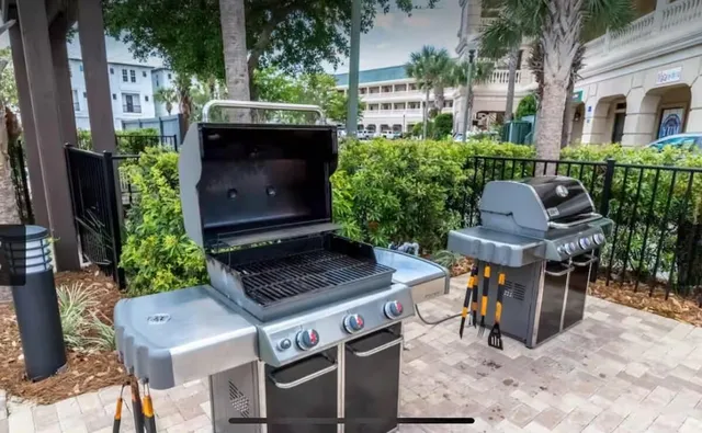 a view of an chairs and table in the patio