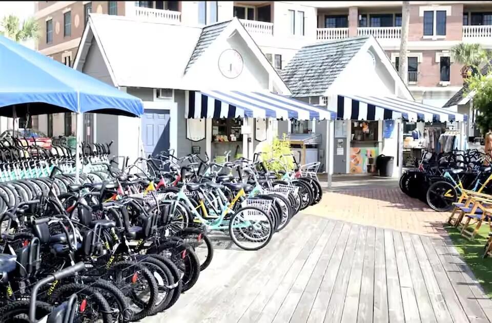10343 East County Highway 30A, Unit B275 Inlet Beach, FL 32413 - Photo 18 of 25 a view of a chairs and table in a patio