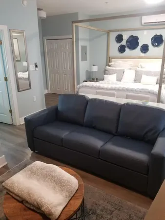 a living room with a couch and a coffee table