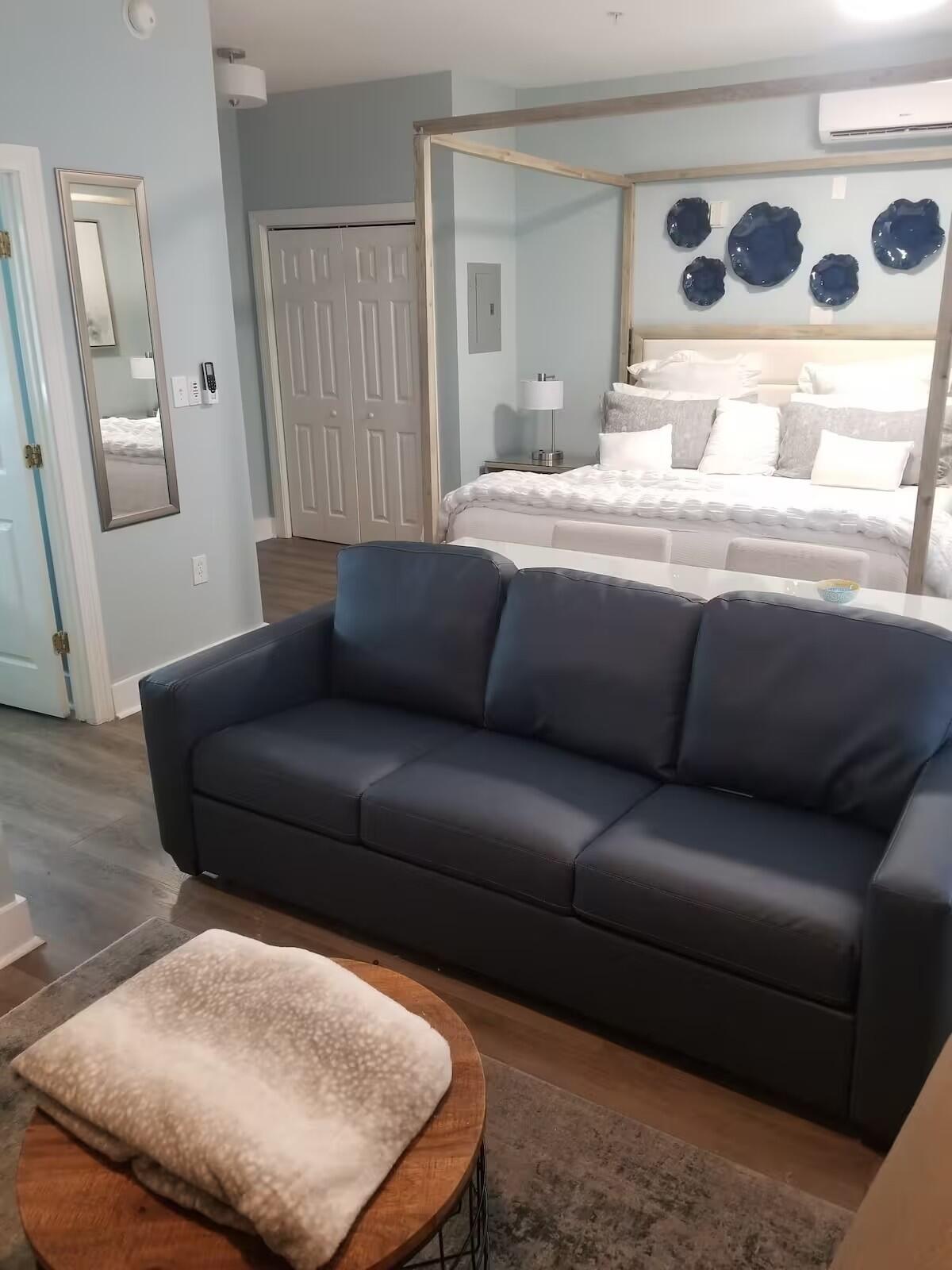 10343 East County Highway 30A, Unit B275 Inlet Beach, FL 32413 - Photo 5 of 25 a living room with a couch and a coffee table